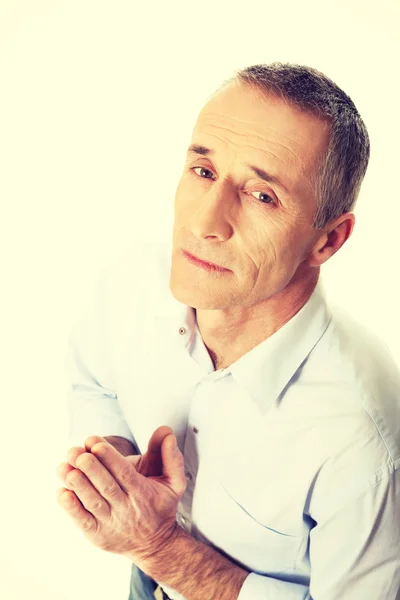 Man kneeling and praying to God — Stock Photo, Image