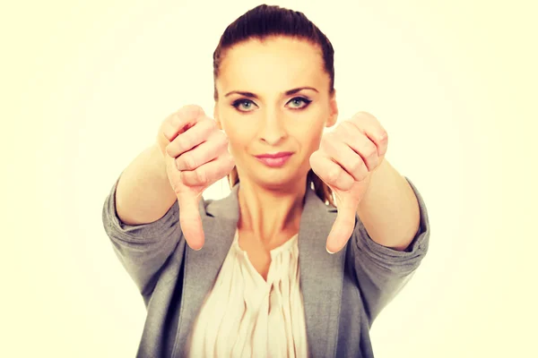 Mujer de negocios mostrando pulgares hacia abajo . —  Fotos de Stock