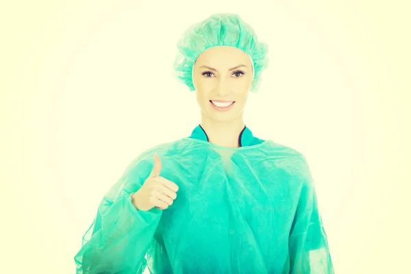 Doktor chirurg žena s palec nahoru. — Stock fotografie