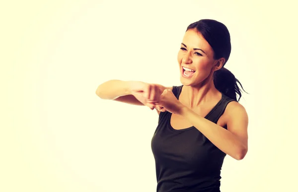 Woman in military clothes boxing to the camera — Stock Photo, Image