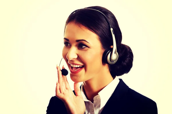 Šťastný operátor telefonu ve sluchátkách — Stock fotografie