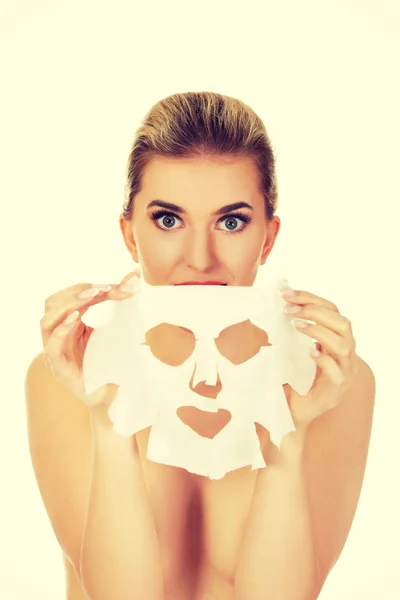 Young  woman with facial mask — Stock Photo, Image