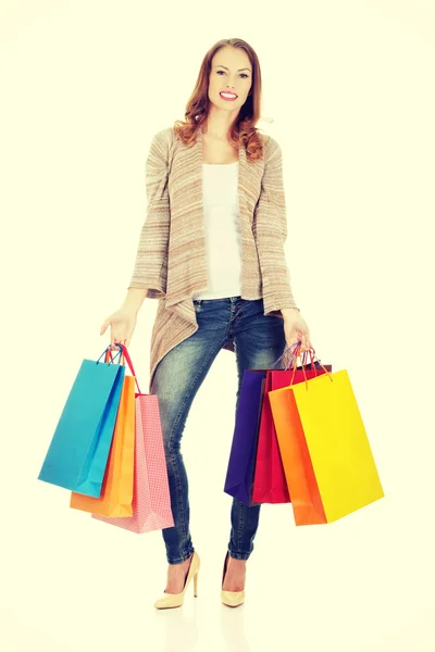 Mulher feliz com sacos de compras. — Fotografia de Stock