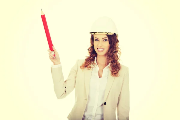 Architect woman pointing up with pencil. — Stock Photo, Image