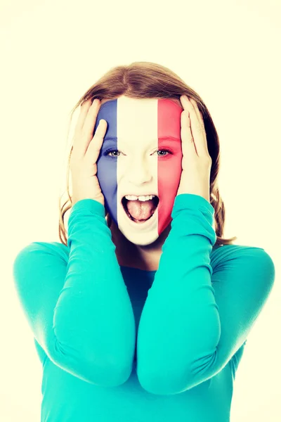 Mujer con bandera francesa en la cara . —  Fotos de Stock