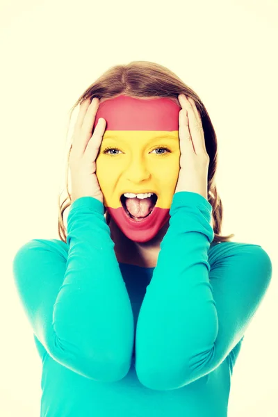 Woman with Spain flag on face. — Stock Photo, Image