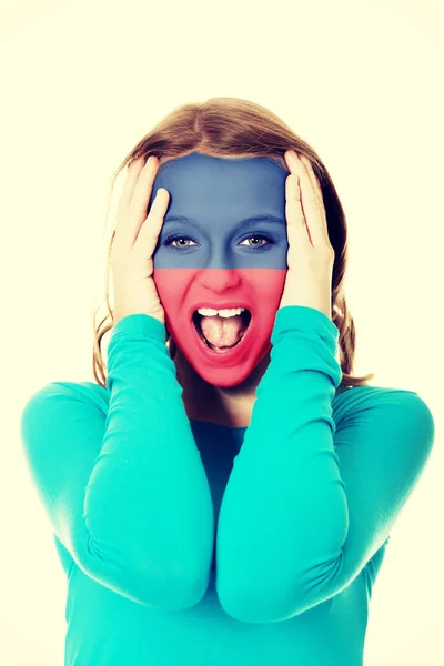 Woman with Liechtenstein flag on face. — Stock Photo, Image