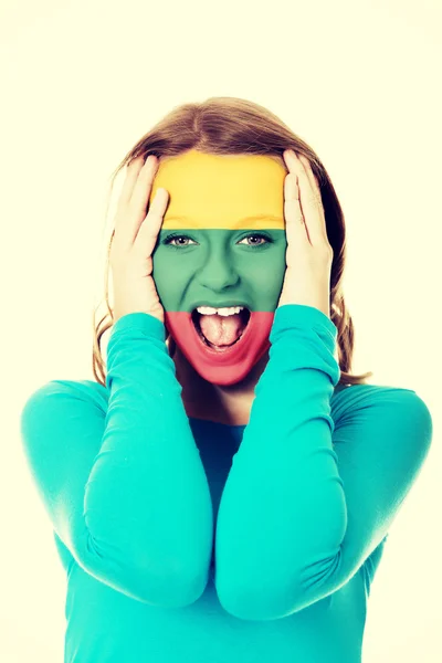 Woman with Lithuania flag on face. — Stock Photo, Image