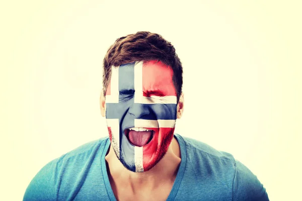 Screaming man with Norway flag on face.