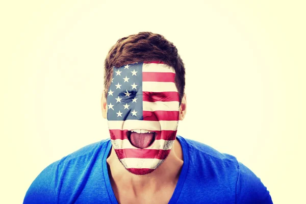 Mężczyzna z Usa bandery na twarzy krzyczy. — Zdjęcie stockowe
