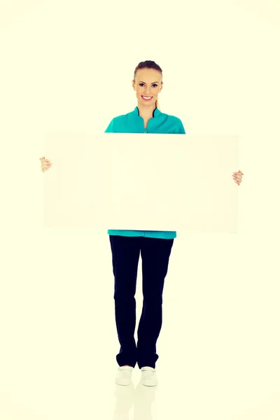 Mujer Doctor Holding Placard . —  Fotos de Stock