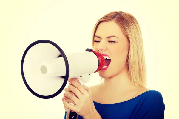 Woman shouting with a megaphone — Stock Photo, Image