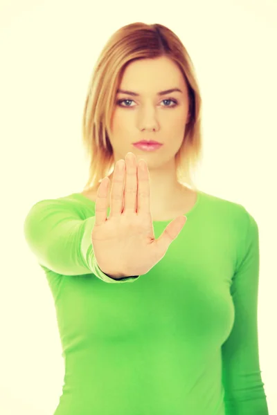 Frau macht Stoppschild mit der Hand. — Stockfoto