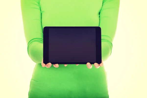 Woman holding a tablet. — Stock Photo, Image