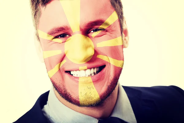 Makedonya bayrak yüzündeki mutlu adam. — Stok fotoğraf