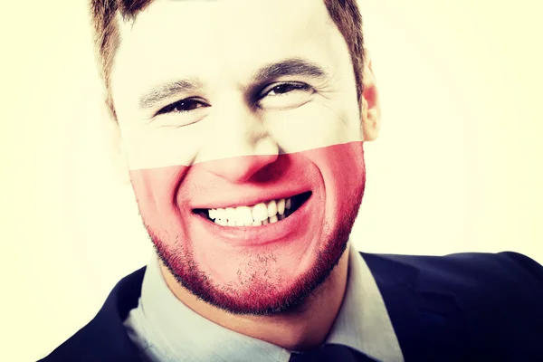Happy man with Poland flag on face. — Stock Photo, Image