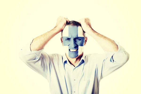 Mature man with Finland flag on face. — Stock Photo, Image