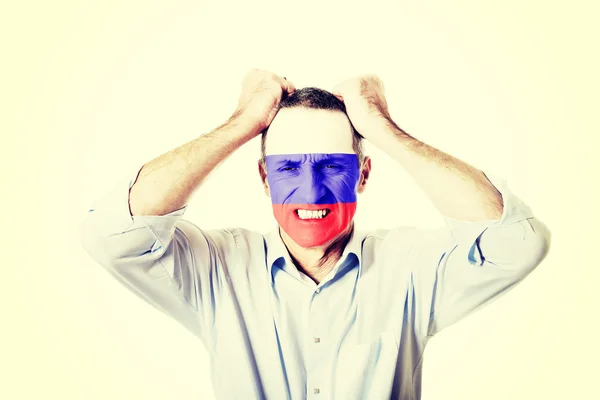 Hombre maduro con bandera de Rusia en la cara . — Foto de Stock