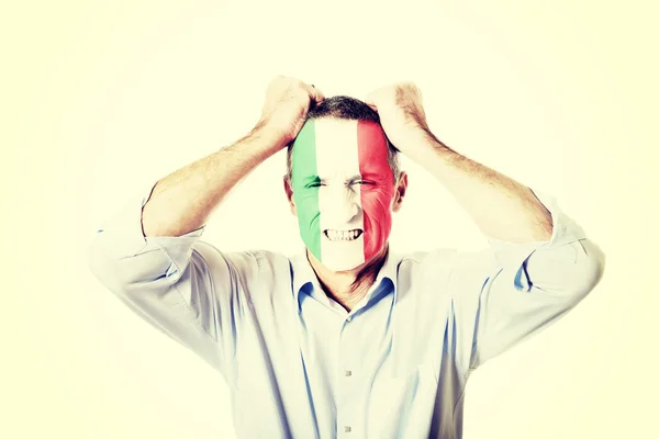 Reifer Mann mit italienischer Flagge im Gesicht. — Stockfoto