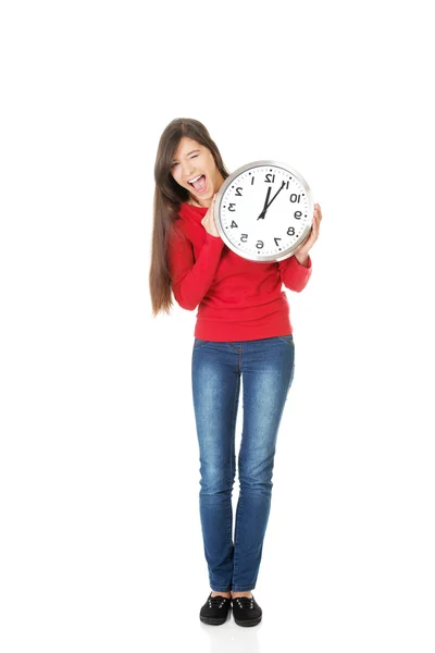 Beautiful woman with the clock. — Stock Photo, Image
