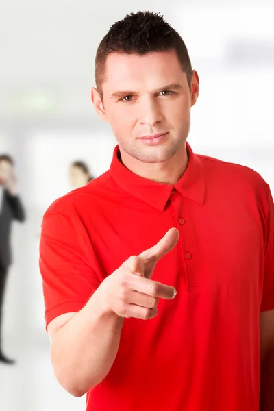 Serious young man pointing you — Stock Photo, Image