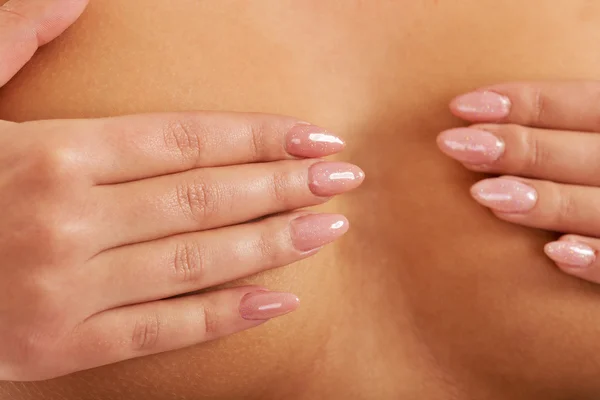 Woman covering her tits. — Stock Photo, Image