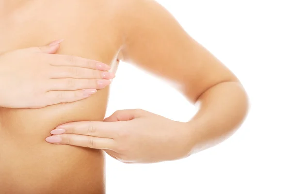 Woman examining breast. — Stock Photo, Image