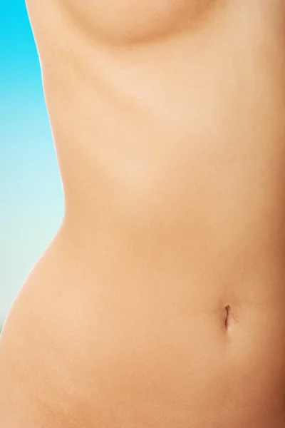 Womans slim belly. — Stock Photo, Image