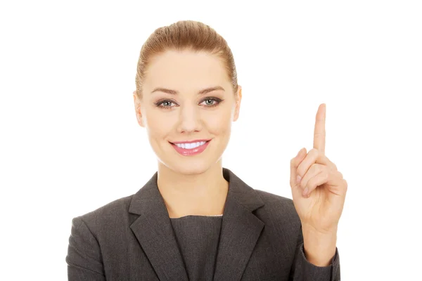 Mujer de negocios señalando hacia arriba . —  Fotos de Stock