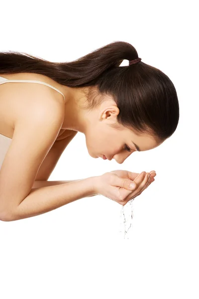 Woman washing her clean face. — Stock Photo, Image