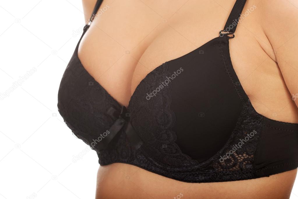 Woman's breast in pink bra. Stock Photo