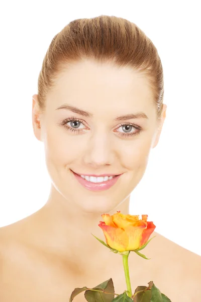 Smiling woman with fresh rose. — Stock Photo, Image