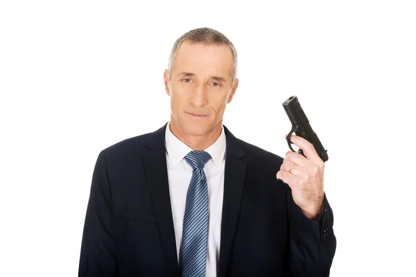 Serious mafia agent with handgun — Stock Photo, Image