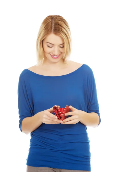 Happy woman with a wallet. — Stock Photo, Image