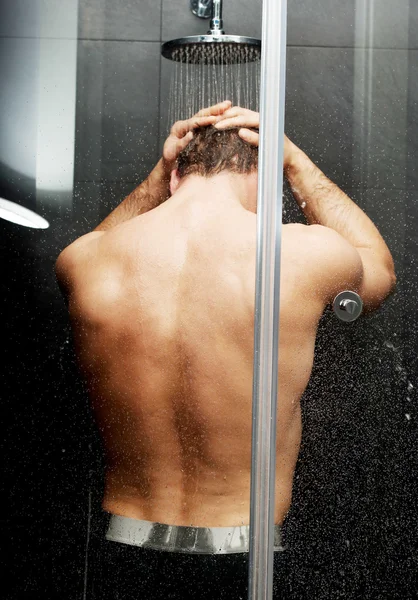 Handsome man at the shower. — Stock Photo, Image