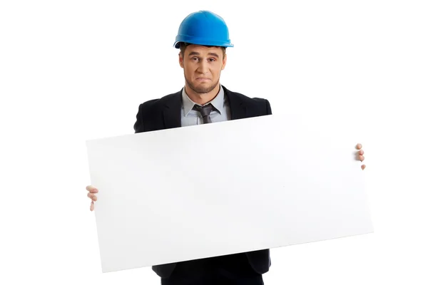 Empresario enginner sosteniendo banner vacío . — Foto de Stock