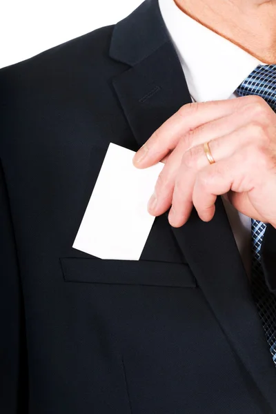 Empresario tomando una tarjeta en blanco del bolsillo —  Fotos de Stock