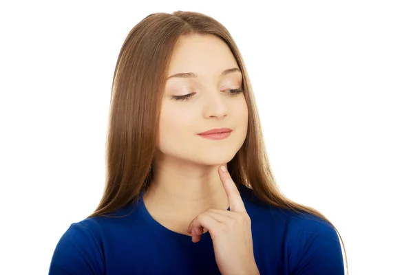 Beautiful thoughtful woman looking down. — Stock Photo, Image