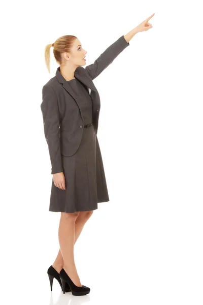 Businesswoman pointing up. — Stock Photo, Image