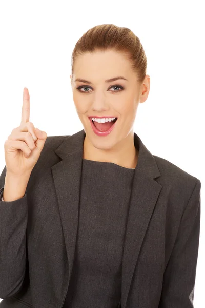 Joven mujer de negocios teniendo una idea — Foto de Stock