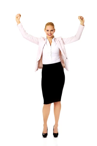 Young happy business woman with arms up Stock Image