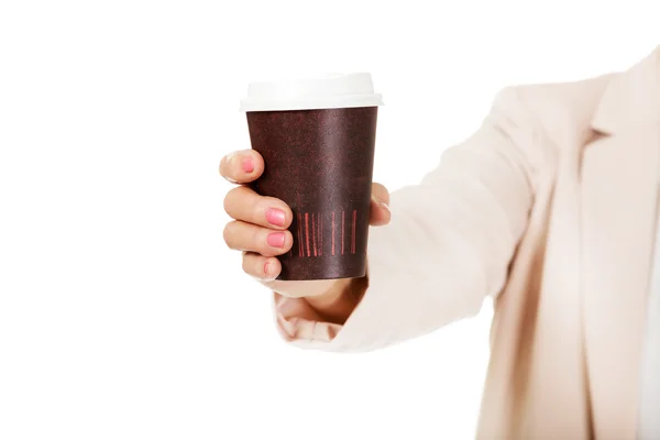 Elderly woman holding paper cup — Stock Photo, Image