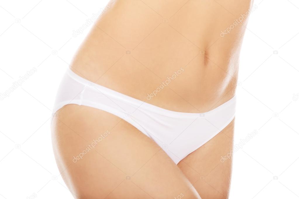 Body of slim young woman in white underwear