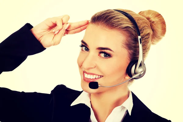 Saludar a la joven empresaria en auriculares — Foto de Stock