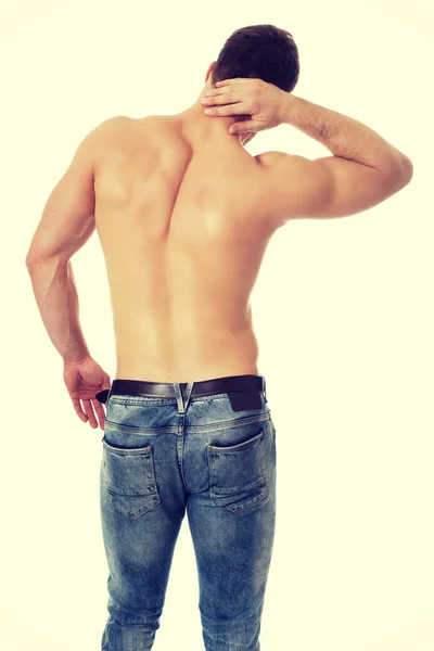 Athletic man feeling pain in his neck. — Stock Photo, Image