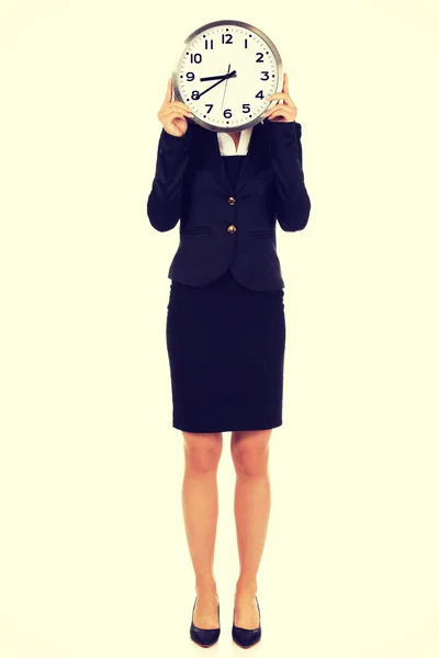 Businesswoman with clock - time concept Stock Image