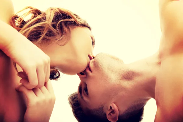Young couple kissing. Stock Picture