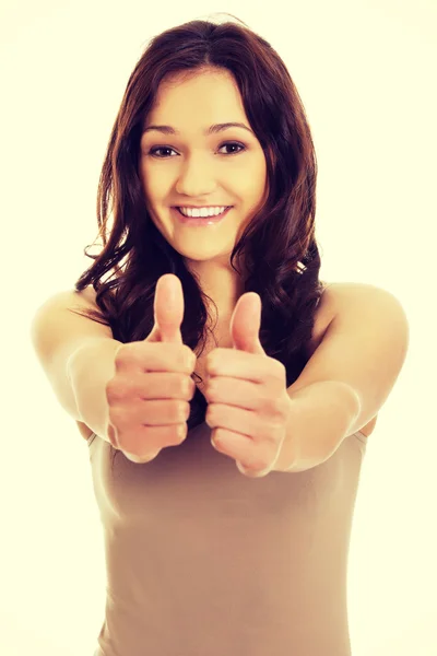 Young woman showing thumbs up. — Stock Photo, Image