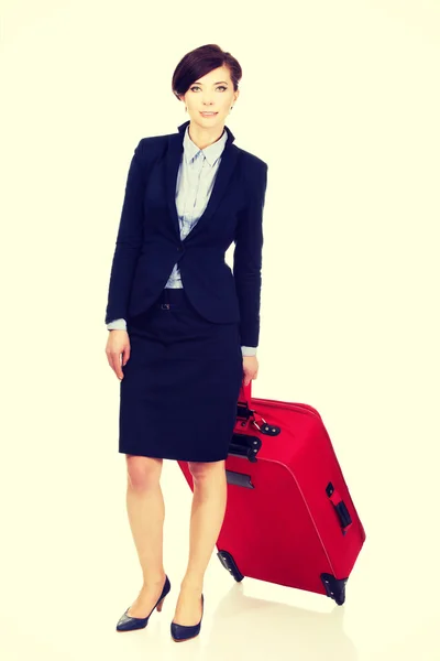 Happy businesswoman with suitcase. — Stock Photo, Image