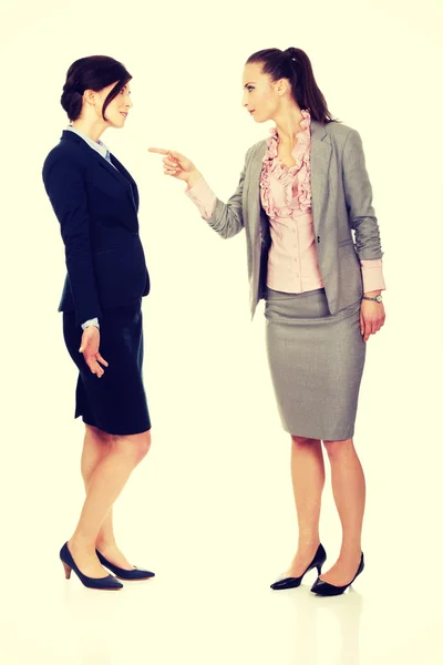 Angry businesswoman accuses her partner. — Stock Photo, Image